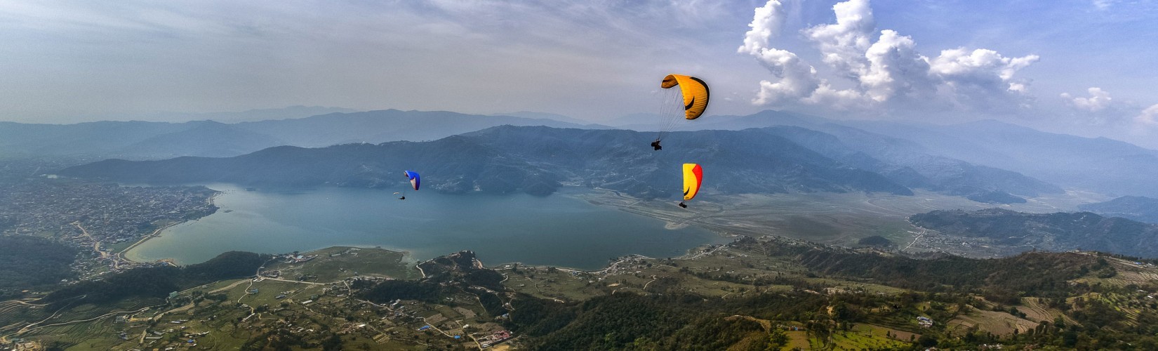 Flying over the Phewa lake paragliding in pokhara 